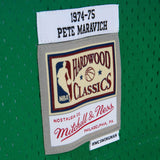 Mitchell &amp; Ness Fadeaway Swingman "Pistol" Pete Maravich New Orleans Jazz 1974-75 Jersey (SMJY4253-NOJ74PMAGNPR)